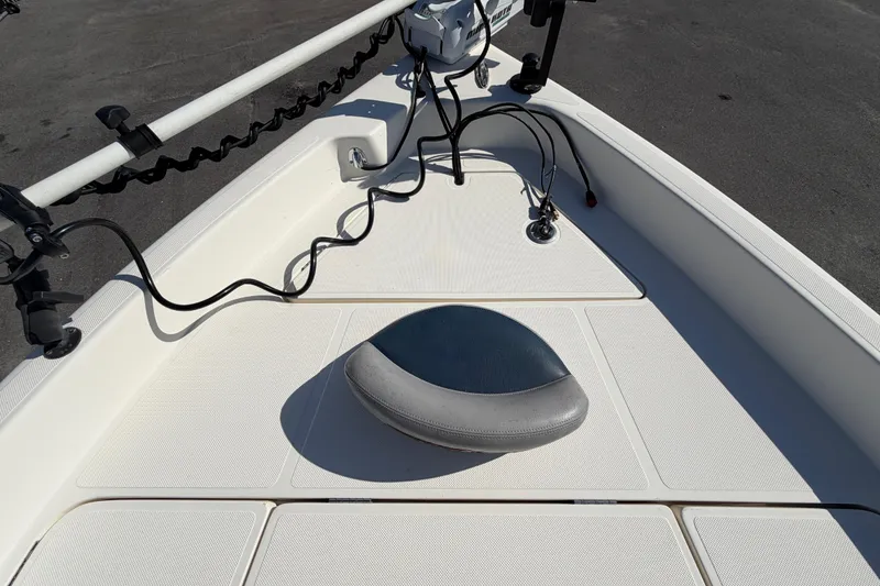 Slide: The Image of 2014 Skeeter SX2250 boat deck with open storage compartment and equipment. - 46