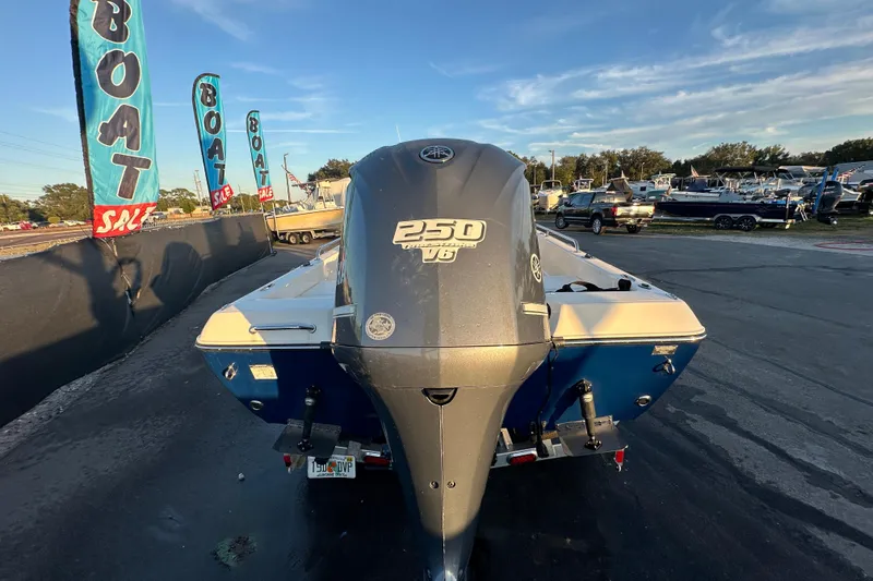 Slide: The Image of 2014 Skeeter SX2250 boat with 250 horsepower V6 four-stroke engine. - 5