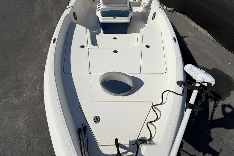 Slide: The Image of 2014 Skeeter SX2250 boat interior with seating and storage compartments. - 50