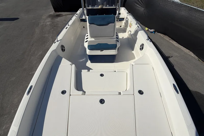 Slide: The Image of 2014 Skeeter SX2250 boat seat with blue and gray upholstery. - 52