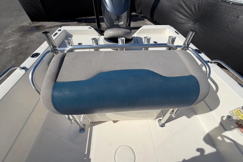 Slide: The Image of 2014 Skeeter SX2250 boat interior with seating and storage. - 61