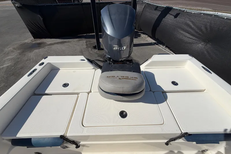 Slide: The Image of 2014 Skeeter SX2250 boat interior with seating and storage compartments. - 66