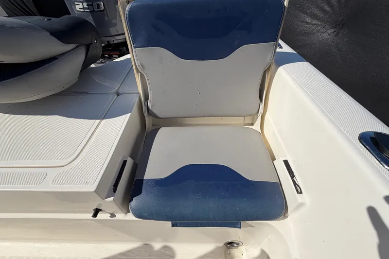 Slide: The Image of Empty storage compartment in 2014 Skeeter SX2250 boat, showing interior details. - 72