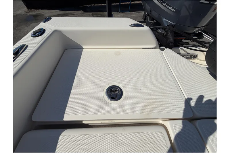 Slide: The Image of Open storage compartment on 2014 Skeeter SX2250 boat, showcasing interior details. - 76