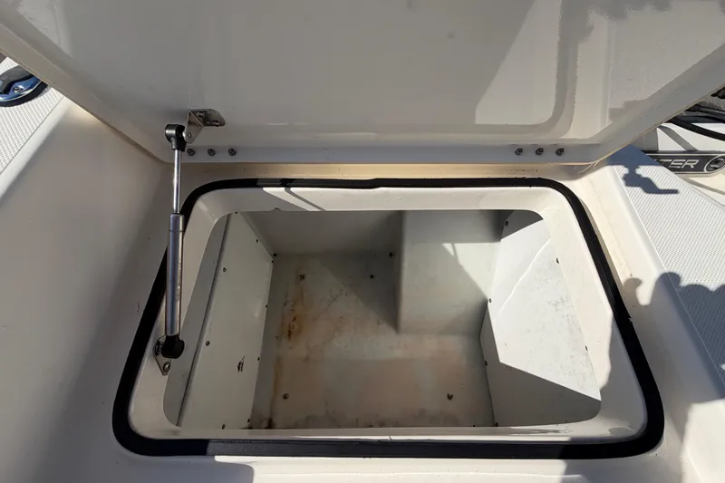 Slide: The Image of 2014 Skeeter SX2250 boat deck with storage compartments and seating. - 78