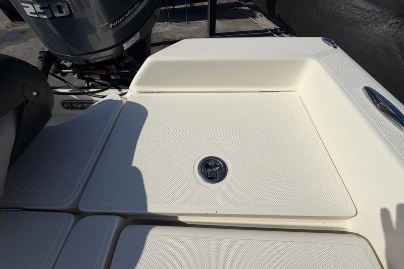 Slide: The Image of 2014 Skeeter SX2250 boat seat with blue and gray upholstery. - 79