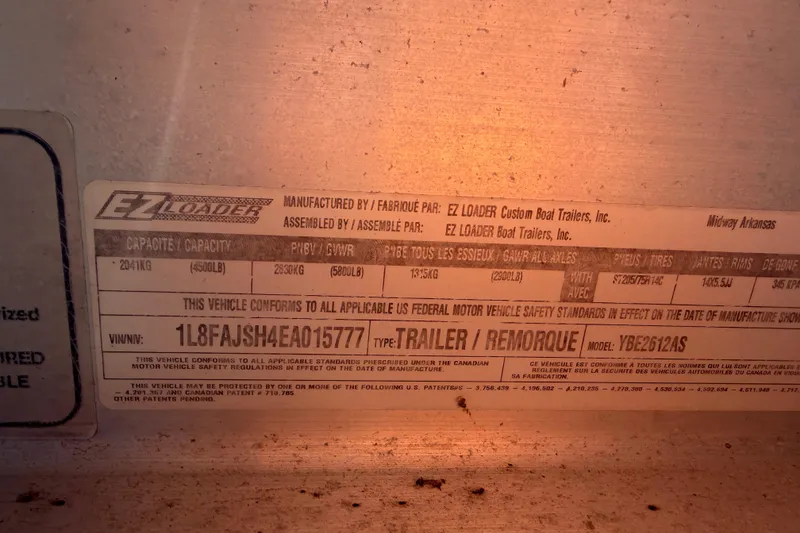 Slide: The Image of 2014 Skeeter SX2250 boat with Yamaha 250 outboard motor. - 87