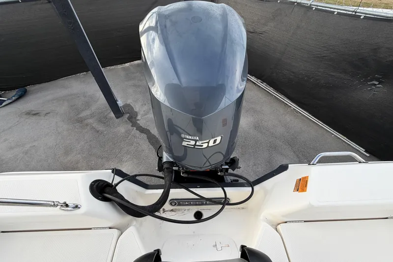 Slide: The Image of Label on Yamaha F250XCA engine, made in Japan, on 2014 Skeeter SX2250. - 92