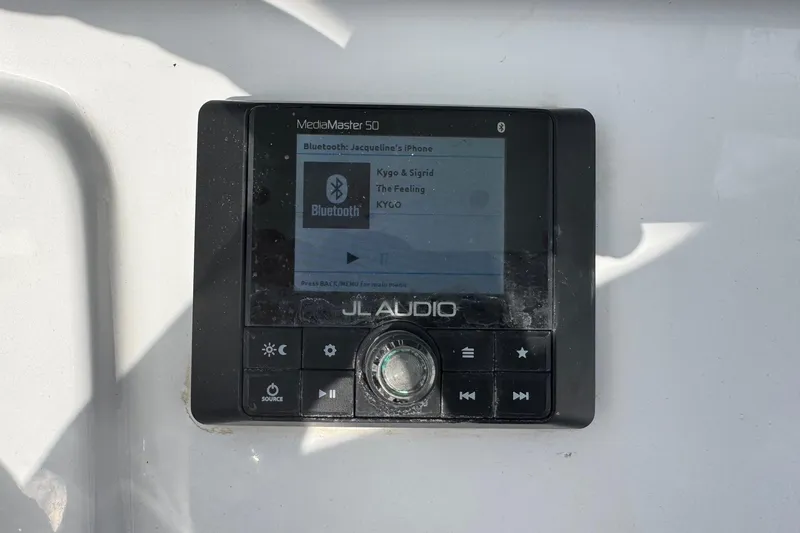 Slide: The Image of JL Audio MediaMaster 50 on 2020 Sportsman Heritage 231 Center Console boat. - 18