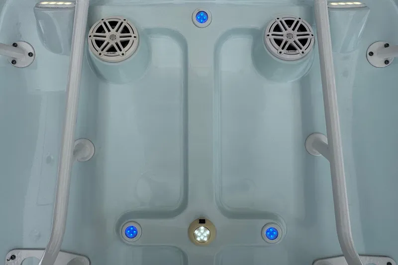 Slide: The Image of 2020 Sportsman Heritage 231 Center Console deck with speakers and blue LED lights. - 23