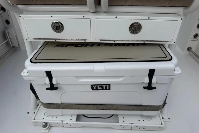 Slide: The Image of 2020 Sportsman Heritage 231 Center Console with Yeti cooler and storage drawers. - 26