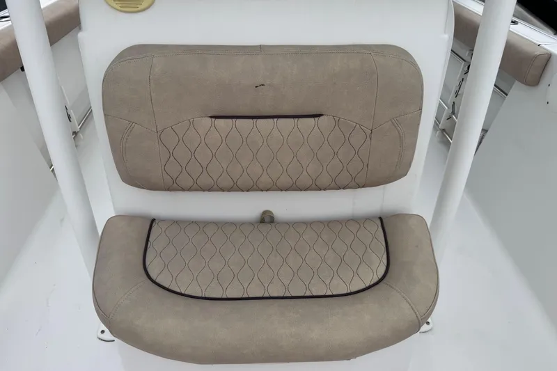 Slide: The Image of 2020 Sportsman Heritage 231 Center Console seat with beige upholstery and diamond stitching. - 36