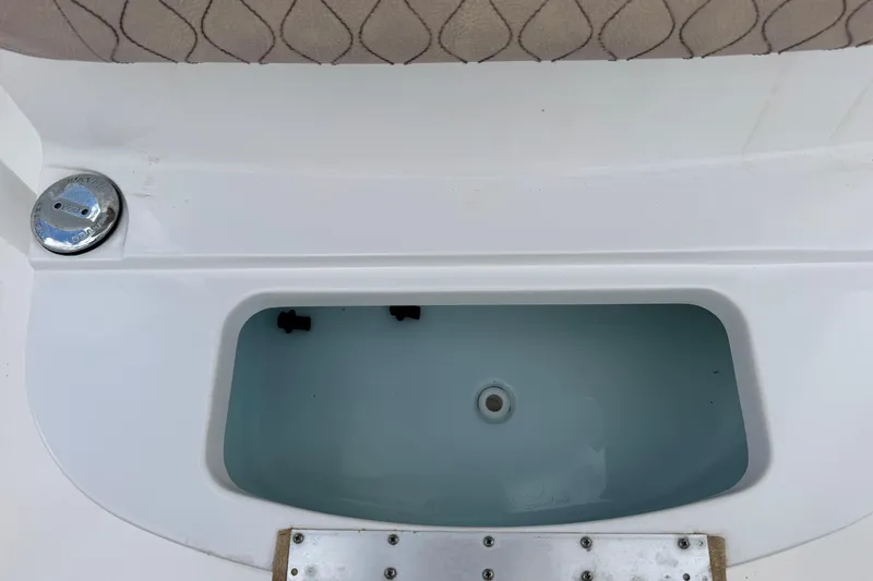 Slide: The Image of 2020 Sportsman Heritage 231 Center Console livewell with cushioned seating. - 37