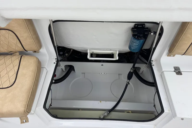 Slide: The Image of 2020 Sportsman Heritage 231 Center Console boat interior with seating and equipment. - 43