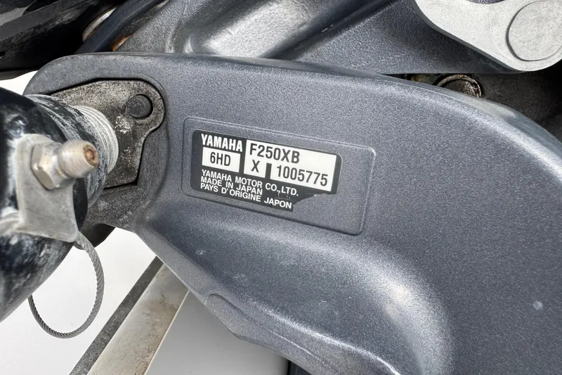 Slide: The Image of Close-up of Yamaha F250XB engine label on 2020 Sportsman Heritage 231 Center Console. - 53