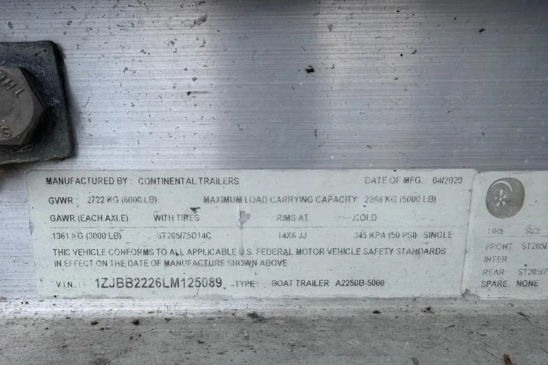 Slide: The Image of Label on Continental Trailers boat trailer, detailing specifications and compliance information. - 54