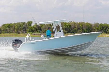 Slide: The Image of Manufacturer Provided Image: 2020 Sportsman Heritage 231 Center Console boat cruising on water. - 56