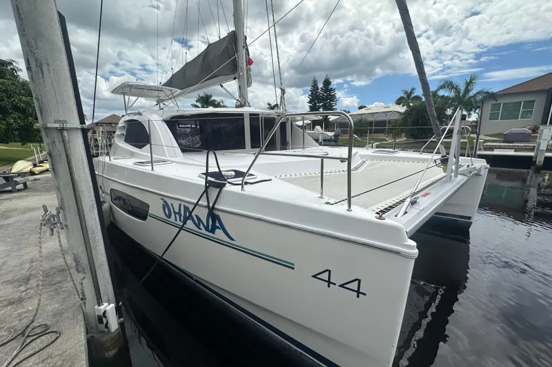 The Image of 2016 Leopard 44 catamaran docked, featuring sleek design and spacious deck. - 0