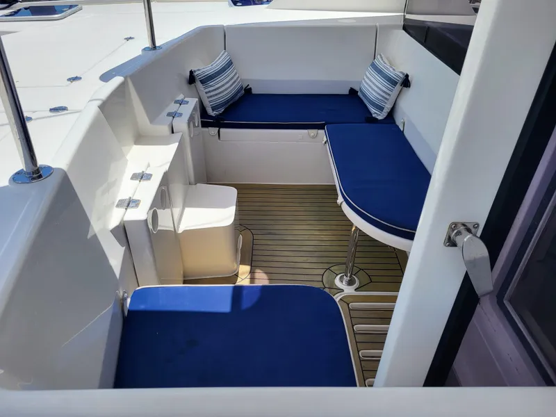 Slide: The Image of Leopard 44 Yacht 2016, comfortable seating area with blue cushions. - 12