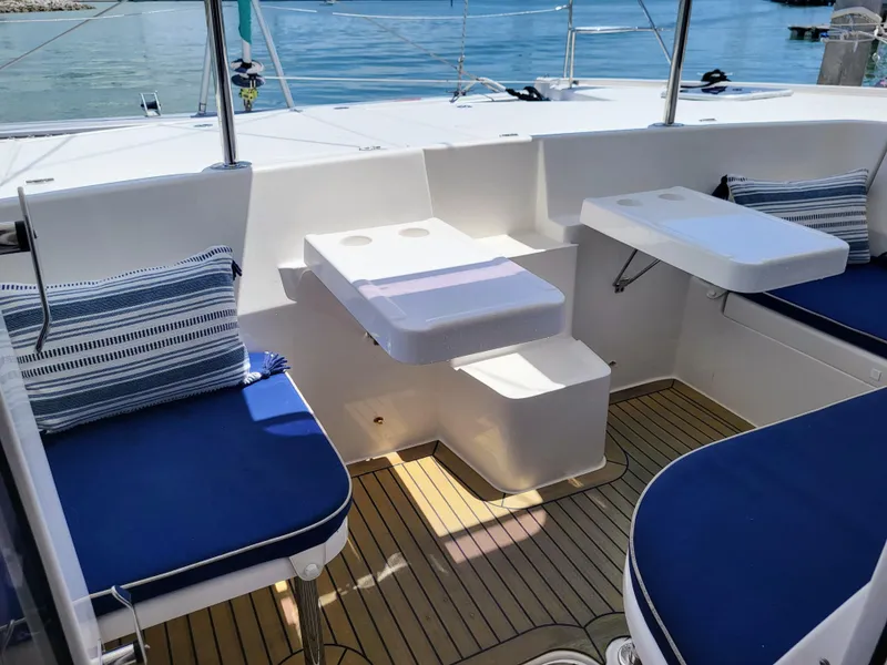 Slide: The Image of Leopard 44 Yacht 2016 with blue cushions and wooden deck. - 13