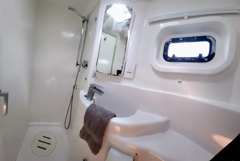 Slide: The Image of Bathroom in Leopard 44 catamaran, year 2016. - 25