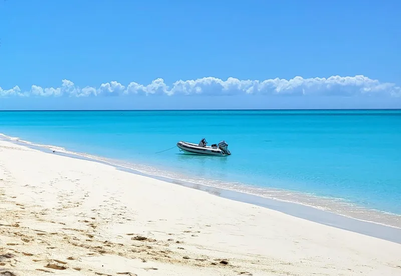 Slide: The Image of Inflatable boat on tropical beach with turquoise water. - 28