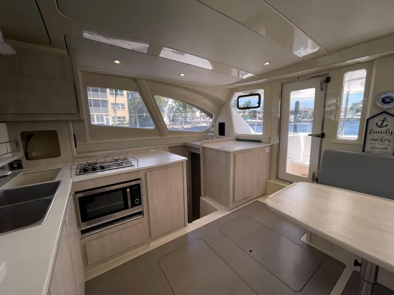 Slide: The Image of Interior of a 2016 Leopard 44 yacht featuring a modern kitchen. - 35