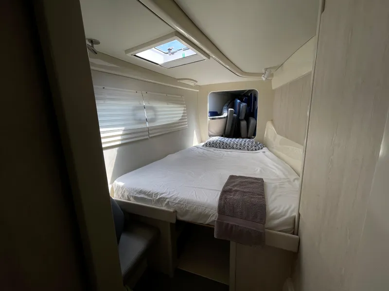 Slide: The Image of Cabin of a 2016 Leopard 44 yacht with bed and skylight. - 37