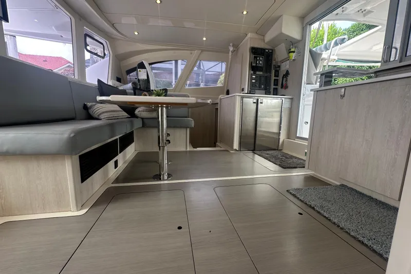 Slide: The Image of Interior of 2016 Leopard 44 catamaran with modern seating and sleek kitchen area. - 38