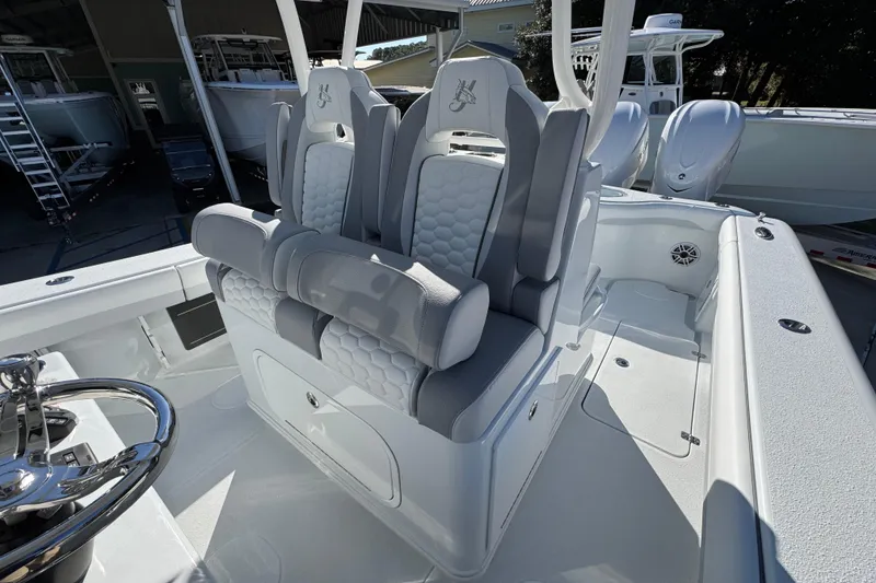 Slide: The Image of 2026 Yellowfin 36 Offshore boat interior with luxurious seating and modern design. - 32