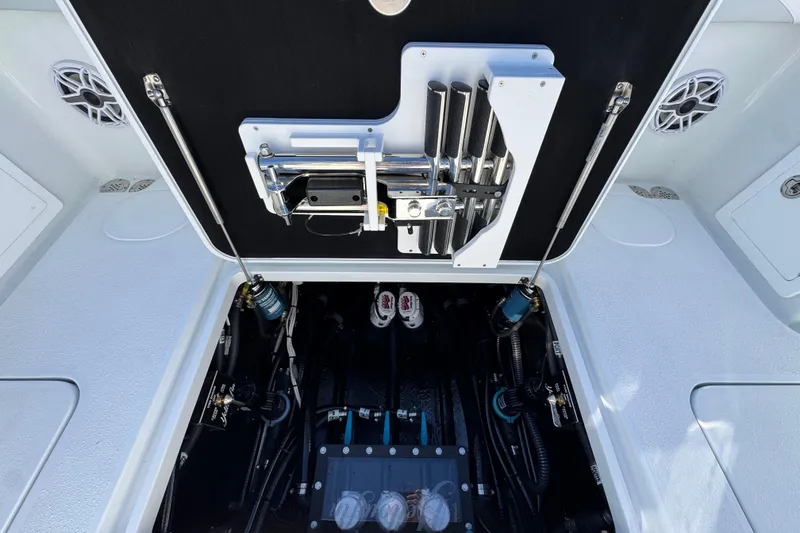 Slide: The Image of 2026 Yellowfin 36 Offshore boat engine compartment with organized wiring and components. - 49