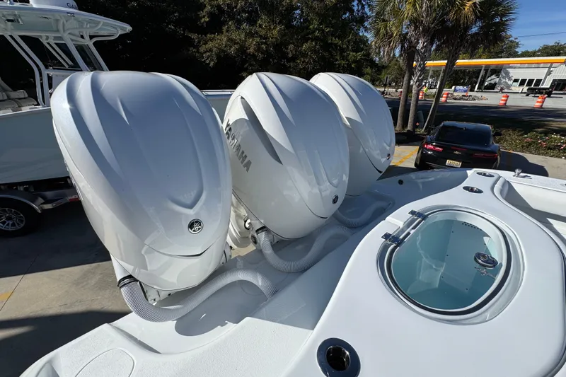 Slide: The Image of 2026 Yellowfin 36 Offshore boat with four Yamaha outboard engines. - 52