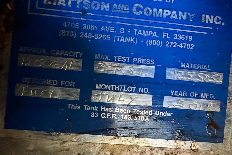 Slide: The Image of Metallic label displaying tank specifications, including capacity, test pressure, and manufacturing details. - 14