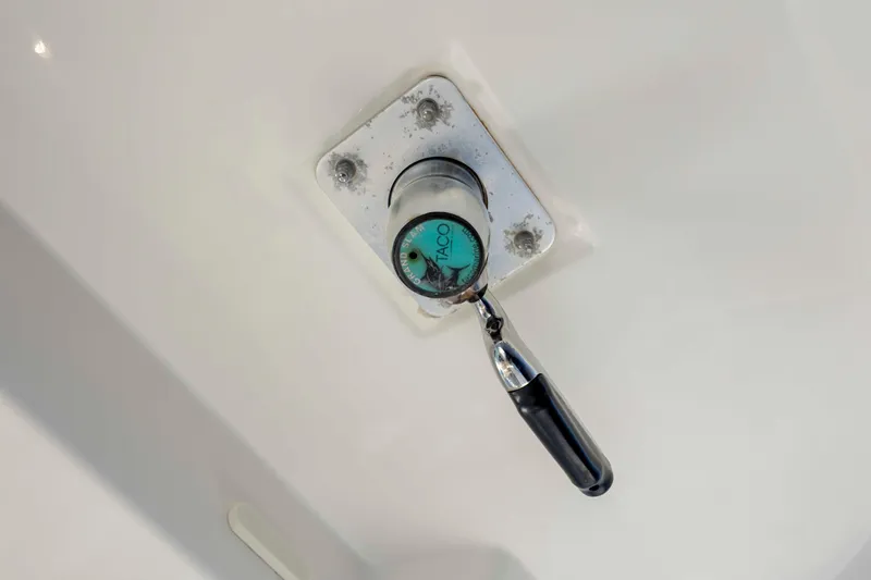 Slide: The Image of Close-up of a 2019 Boston Whaler 350 Outrage boat component with a handle. - 23