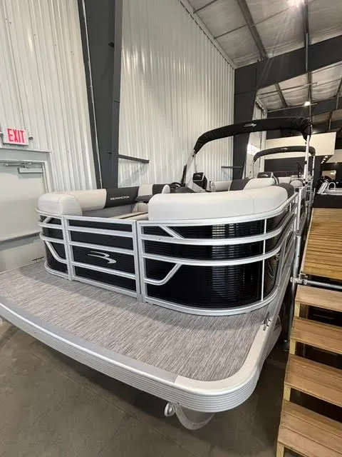 Slide: The Image of 2026 Bennington S-1 22 SSR Twin Tube pontoon boat in showroom. - 14