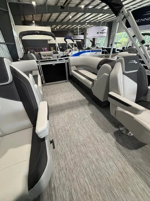 Slide: The Image of Interior of a 2026 Bennington S-1 22 SSR TWIN TUBE boat in showroom. - 5