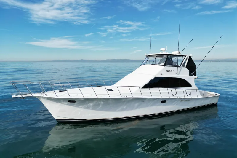 The Image of 1993 Ocean 65 Custom yacht on calm sea under clear blue sky. - 0