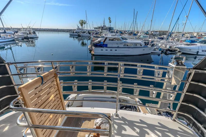 Slide: The Image of View from 1993 Ocean 65 Custom yacht overlooking marina with multiple boats docked. - 17