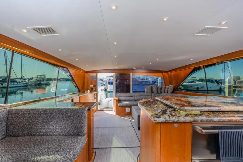 Slide: The Image of Luxurious interior of 1993 Ocean 65 Custom yacht with elegant wood and granite finishes. - 27