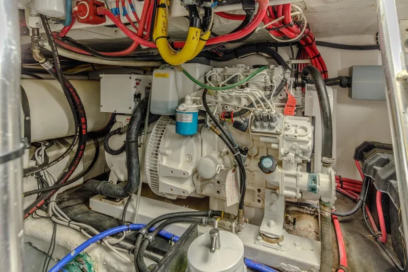 Slide: The Image of Engine room of 1993 Ocean 65 Custom yacht with complex wiring and machinery. - 47