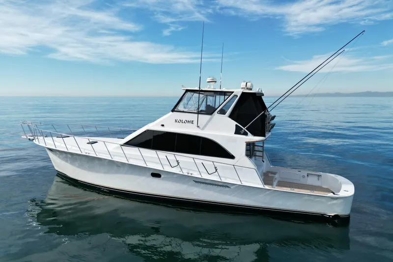 Slide: The Image of 1993 Ocean 65 Custom yacht on calm sea under blue sky. - 5