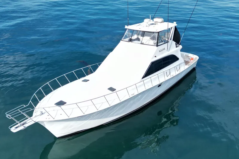 Slide: The Image of White 1993 Ocean 65 Custom yacht on calm blue water. - 6