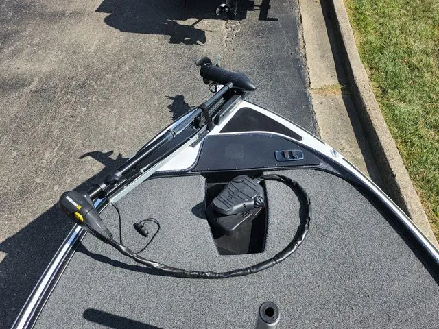 Slide: The Image of 2021 Nitro Z17 boat deck with trolling motor and control panel. - 17