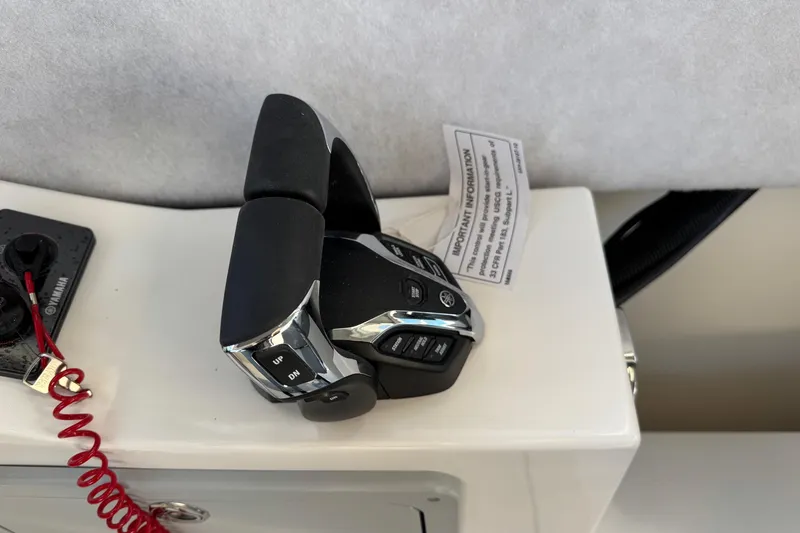 Slide: The Image of Throttle control of 2026 Defiance Admiral 250 EX boat with Yamaha components. - 76