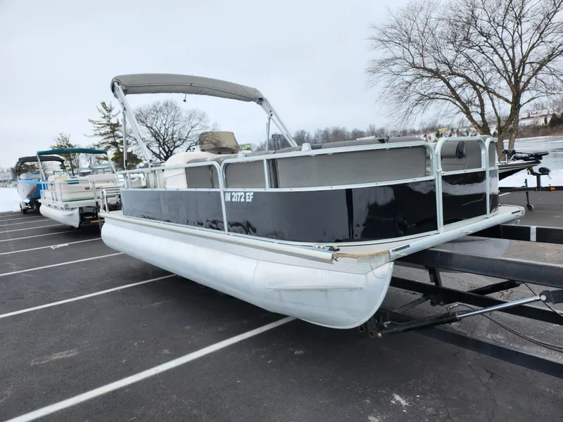 Slide: The Image of 2010 Misty Harbor 2085CR Adventure Cruiser pontoon boat on trailer in parking lot. - 8