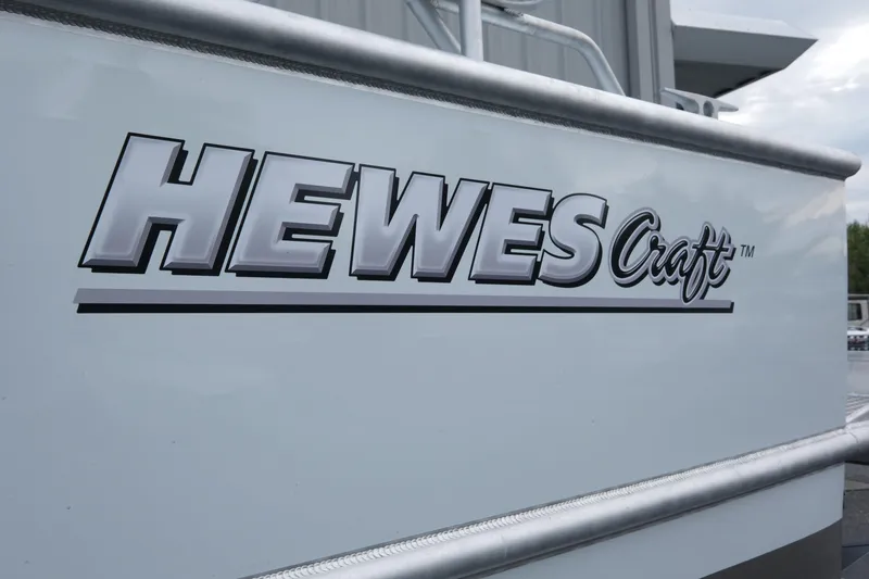 Slide: The Image of 2025 Hewescraft 270 Alaskan boat logo on side panel. - 5