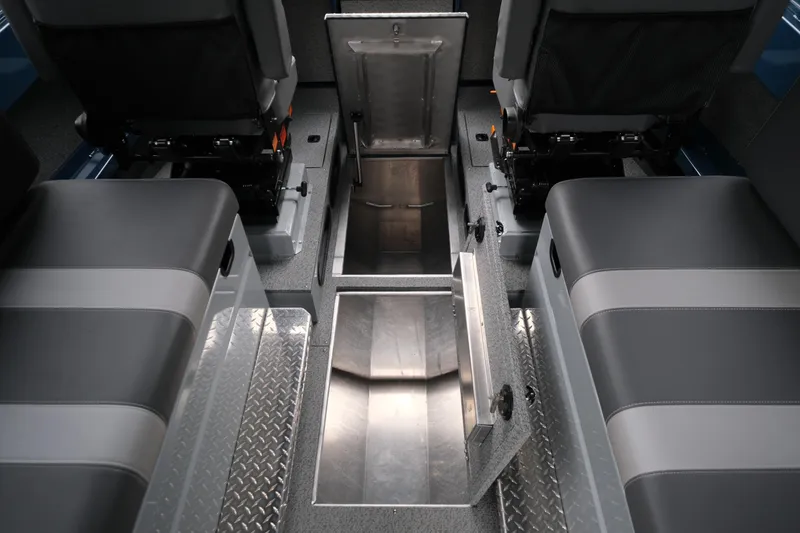 Slide: The Image of Interior view of 2025 Hewescraft 270 Alaskan boat, featuring storage compartments and seating. - 20