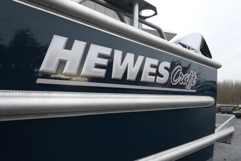 Slide: The Image of 2026 Hewescraft 250 Pacific Explorer boat with logo detail. - 6