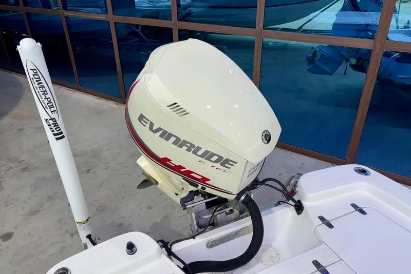 Slide: The Image of Boat with Evinrude motor and Power-Pole Pro II, BlackJack 224, 2013 model. - 24