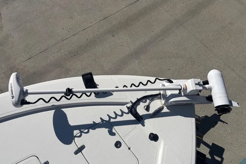 Slide: The Image of 2013 BlackJack 224 boat with Minn Kota trolling motor on deck. - 9